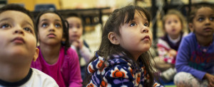 ARLINGTON, VA - JANUARY 14:  (L-R) Students Noah Zambrana, 5, Eden Eyasu, 5, Daniela Ortiz, 5, and Hilina Amlaku, 4, quietly listen in art class at Campbell Elementary School on Tuesday, January 14, 2014. Most Virginia's state-funded preschool classes go unfilled each year because local school districts don't provide matching funds. Arlington County is an exception, with a very large publicly funded preschool program.  (Melina Mara/The Washington Post via Getty Images)